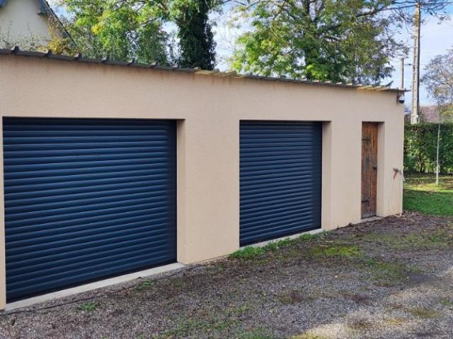 Installation de 2 portes de garage à enroulement à Sainte Marie d’ATTEZ (27160 )