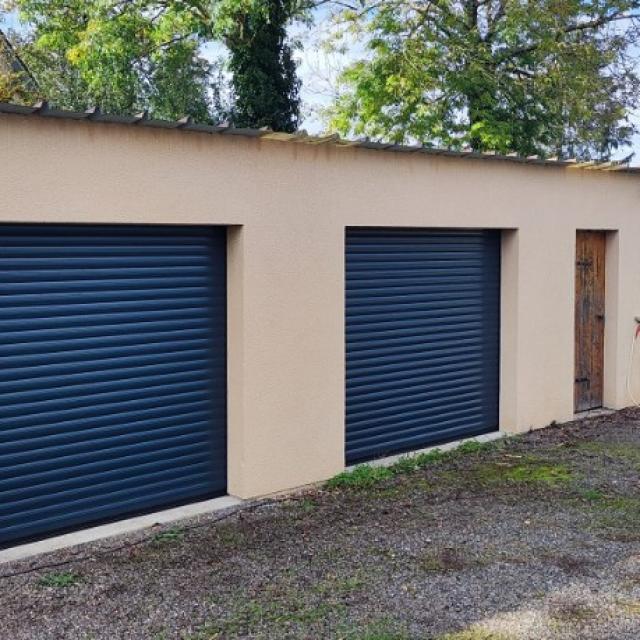 Installation de 2 portes de garage à enroulement à Sainte Marie d’ATTEZ (27160 )